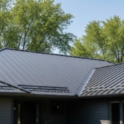 Completed Minnesota home with a new standing seam metal roof designed for durability in harsh weather.